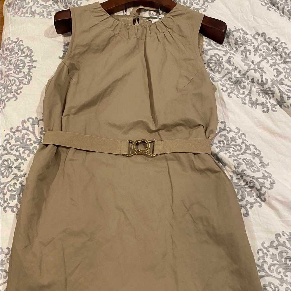 Banana Republic. Beautiful and comfortable dress! Worn once to a wedding.